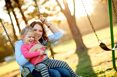 Buy stock photo Park, happy and mom with child on swing for fun, adventure and playing together on weekend morning. Family, nature and mother with girl on playground for bonding, relationship and connection outdoor