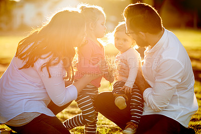 Buy stock photo Parents, family and girls in park, love and bonding together with happiness, nature and fun. Outdoor, mother and father with kids, development and playing with daughters, summer holiday and sunshine