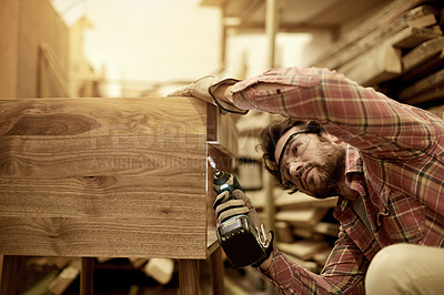 Buy stock photo Artisan, drill and man in small business for manufacturing, cupboard or production process. Workshop, woodwork and creative carpenter with power tools in warehouse for craft, trade or manual labor