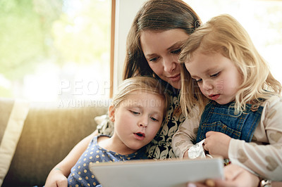 Buy stock photo Mom, children and tablet on sofa with smile, love and together for video, cartoons and relax in home. Woman, girls and digital tech for social media, games or movies in living room in family house