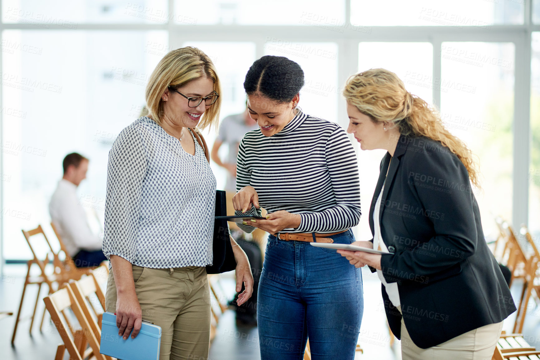 Buy stock photo Business people, meeting and pointing with tablet for expo, conversation or discussion together. Group, team or employees with technology, network or data sync for tradeshow, app or chat in workplace