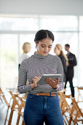 Buy stock photo Creative, woman and reading with tablet in office for research, editor feedback and proofreading. Journalist, digital and review for fact check, editing article and update draft of publication agency