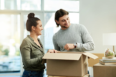 Buy stock photo Packing, happy and couple with box in new home for moving, relocation and purchase property. Real estate, relationship and man with woman in apartment with package for rental, mortgage and house