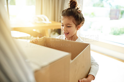 Buy stock photo New home, boxes and girl with smile, excited and reaction with rent for property, happiness and goals. Apartment, cardboard and real estate with lens flare, child and mortgage with investment