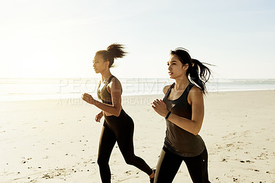 Buy stock photo Fitness, women and friends running by ocean for workout, training and health outdoor in nature. Team, runners and exercise at beach together for endurance, cardio and jog for sports with space