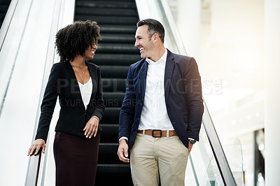 Buy stock photo Business, people and discussion on escalator in office for corporate growth, networking and chat. Learning, mentor and intern with conversation on moving stairs for career planning or company insight