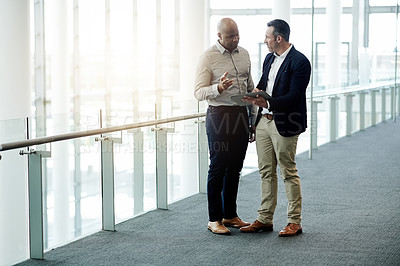 Buy stock photo Office, tablet and business men in meeting for online proposal, project and financial review. Corporate lobby, discussion and people on digital tech for planning, collaboration and finance report