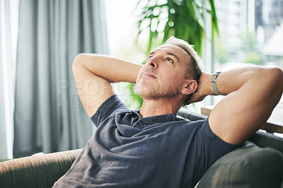 Buy stock photo Stretching, rest and man on sofa with thinking, relax and break on weekend for peace in living room. Person, idea and comfortable on couch with lounge, chilling and morning reflection in apartment