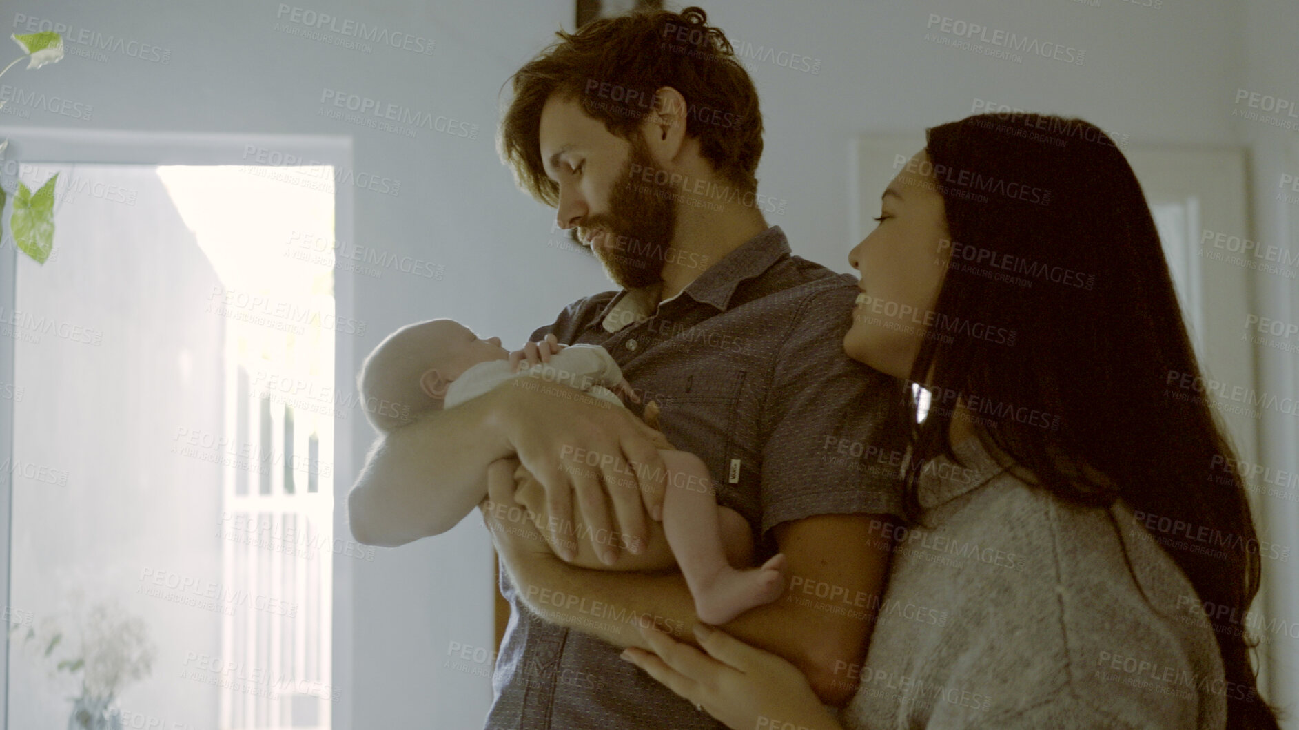 Buy stock photo Mom, hug or dad with newborn in a family for care, love or bond together for child development. Parents, relax or father with mother or infant baby for support, trust or comfort in lounge at home