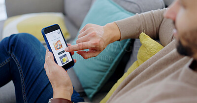 Buy stock photo Man, hands and food menu with phone screen on sofa for online shopping or takeaway in home. Male person, user or shopper scrolling with technology display for virtual restaurant, meal or delivery app