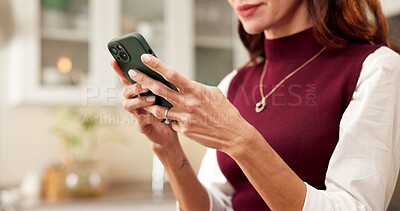 Buy stock photo Hands, woman and typing with phone in home for text message, status update and networking app. Kitchen, person and cellphone in house for mobile chat, social media post and internet search for reels
