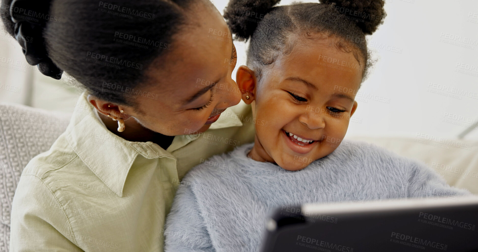 Buy stock photo Mom, love and child with tablet in home, laughing and watching cartoons with subscription in lounge. Family, bonding and black woman with daughter, happy and streaming movie with technology in house