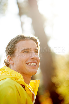 Buy stock photo Thinking, fitness and happy man in nature for exercise, planning workout or idea for training practice. Runner, thoughts and male person outdoor for sports, health and vision with smile for wellness