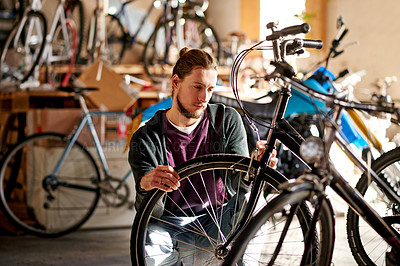 Buy stock photo Business, bicycle and man in store, inspection and fix with skills, startup and eco friendly travel. Shop owner, entrepreneur or bike in workshop, merchandise and cyclist with maintenance or checking
