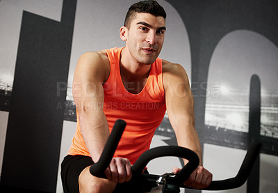 Buy stock photo Workout, man and exercise bike at gym for burning calories, cardio training or muscle strength. Fitness, portrait and male athlete on stationary equipment for cycling, endurance or sports performance