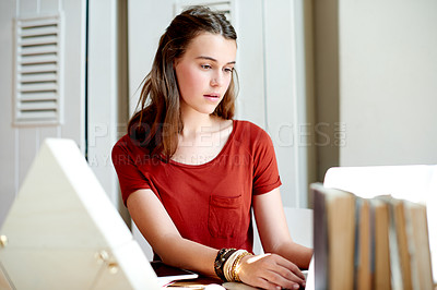 Buy stock photo Teenager, laptop and education with girl in home for essay assignment, homework and virtual class. Online course, elearning and scholarship report with young student and typing for research and idea