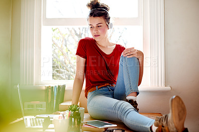 Buy stock photo Headphones, laptop and girl relax in home for streaming service, elearning or listen to audiobook. Radio, technology and teenager on internet for music, podcast and student watch video on study break