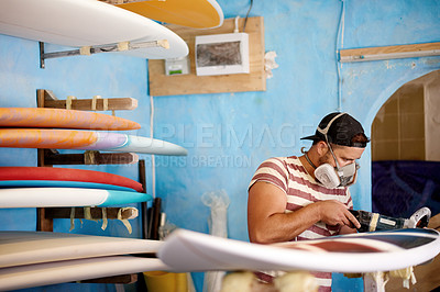 Buy stock photo Design, man and surfboard in workshop for fixing, maintenance or manufacturing. Artistic production, sanding and creative wooden craft in small business for surfing equipment or renovation processes