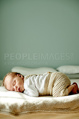 Buy stock photo Newborn, baby and sleeping on bed for growth, calm and peaceful nap with mockup space in home. Child, serene or asleep for early childhood development, rest or relax with infant dreaming in house