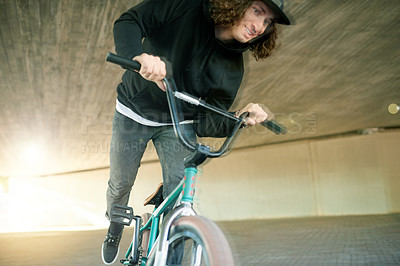 Buy stock photo BMX, motion blur and ride with man on bike for activity, adrenaline hobby or sports training. Exercise, risk and speed with extreme person on bicycle underground for action, cycling or energy