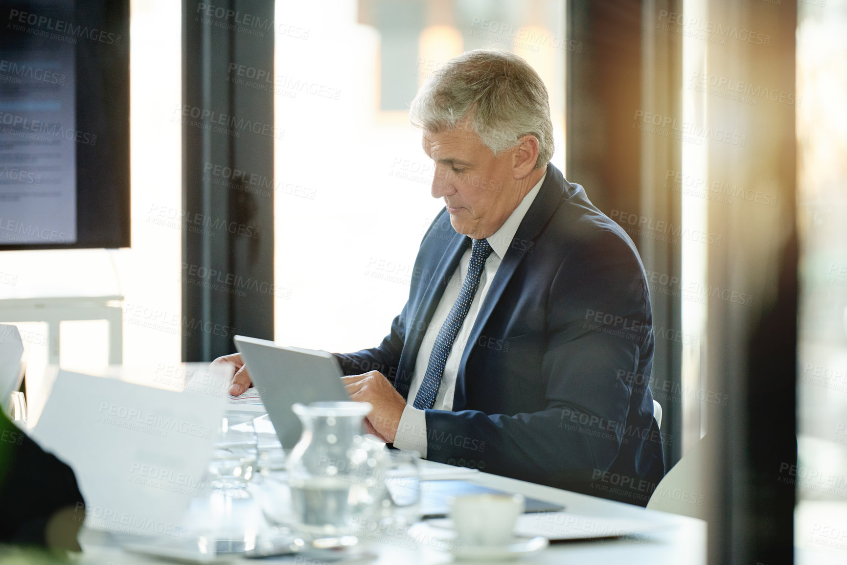 Buy stock photo Business, meeting and man in office, laptop and documents with financial agency, planning and trading. Stock market exchange, person and employee in workplace, report for income and funding proposal