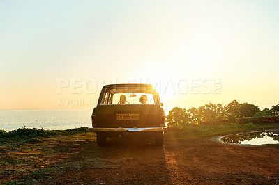 Buy stock photo Shot of two young women on a road trip