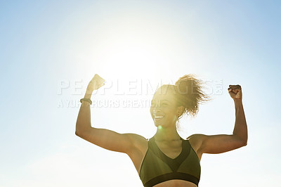Buy stock photo Arms, fitness and smile with woman on beach for celebration of goals, progress or target. Biceps, blue sky and flexing muscles with happy athlete outdoor for exercise, strength training or workout