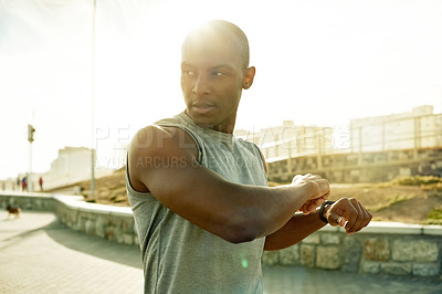 Buy stock photo Exercise, black man and stretching arms in city for workout fitness, muscle flexibility and cardio. Flare, athlete and wellness warm up outdoor for training preparation, getting ready and performance