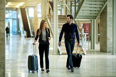 Buy stock photo Team, travel and luggage with business people in airport for conference, professional trip and seminar. Convention arrival, suitcase and tradeshow expo with employees walking for symposium and event