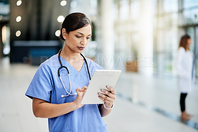 Buy stock photo Nurse, tablet and scroll in hospital for medical schedule, information or review healthcare history. Technology, woman and worker in clinic to reading email, update report and research on internet