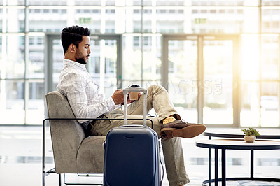 Buy stock photo Journey, coffee and businessman with phone at airport for notification, schedule or online booking. Flight, mobile and employee waiting at lobby with drink for travel, check email and trip with flare