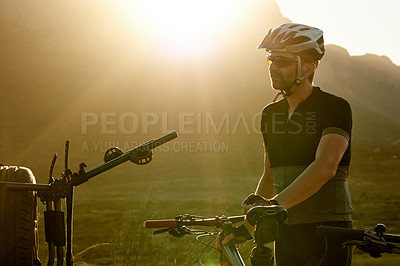 Buy stock photo Adventure, fitness and man with bicycle, nature and preparing for competition, athlete and wellness. Healthy, cyclist and person with helmet for bike, flare and eco friendly transport to travel