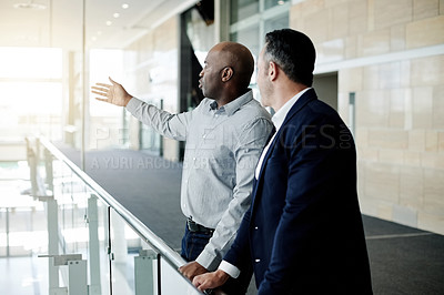 Buy stock photo Real estate, planning and people pointing to building for office expansion, view property and ideas. Meeting, client and developer with vision for project development, commercial sale and investment