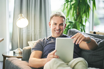 Buy stock photo Tablet, smile and relax with man on sofa for streaming service, connection and watching movie. Film subscription, entertainment and series browsing with person in living room of home for break