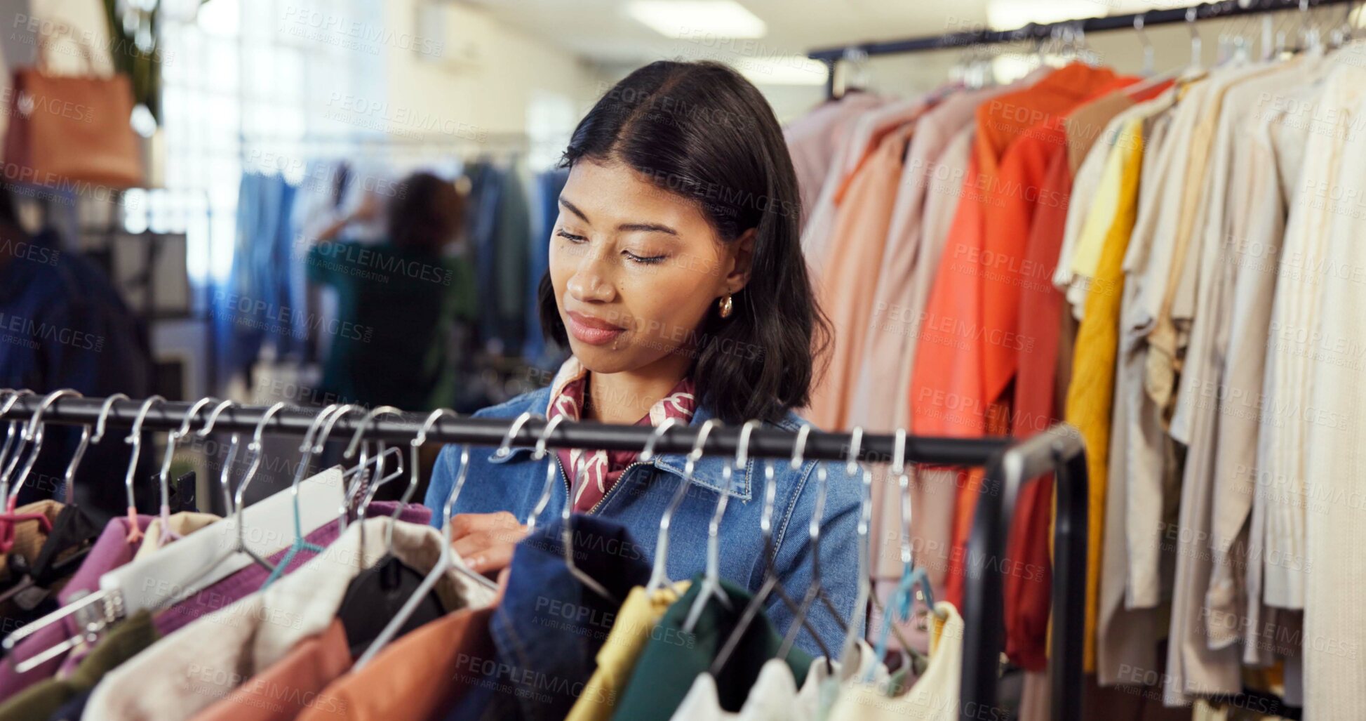 Buy stock photo Shopping, search or woman in store with clothing rack, outfit check or decision in trendy style. Retail, option or customer in boutique with rail, garment choice or selection in fashion purchase.