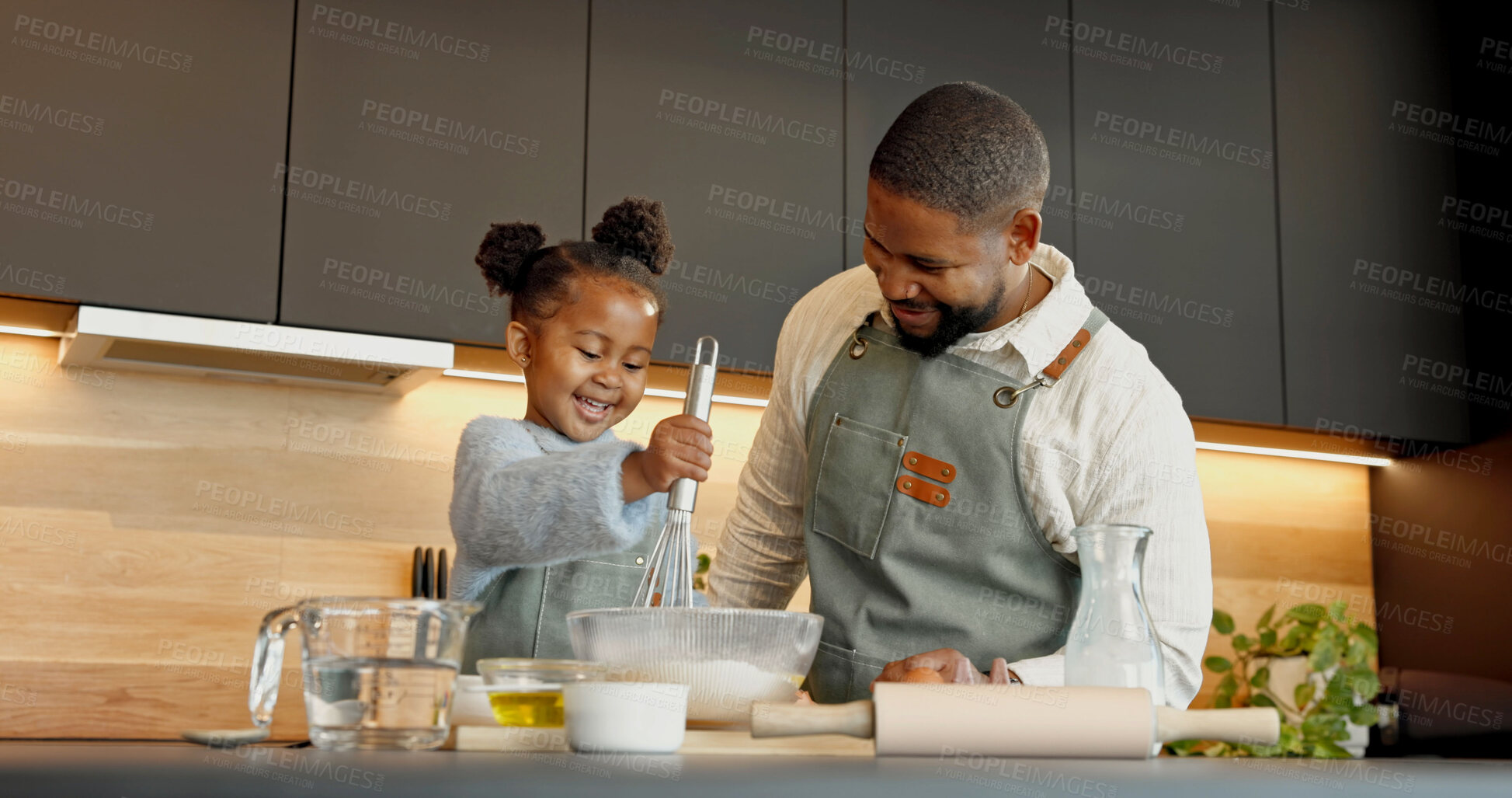 Buy stock photo Father, child and baking in kitchen with whisk, teaching recipe and support with happy black family. Funny girl, parent and mixing flour in bowl, laughing and learning cooking with daughter at house