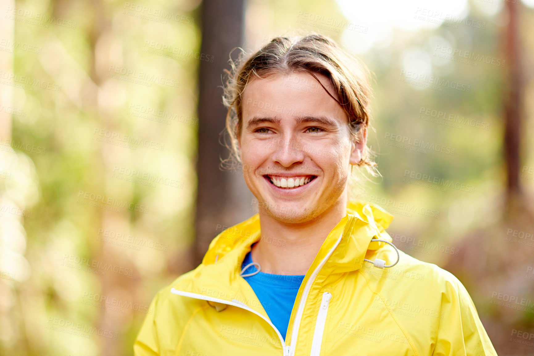 Buy stock photo Fitness, hiking and smile of man in forest for cardio training, sports or workout routine. Exercise, thinking and winter with happy athlete or hiker outdoor in mountains for challenge or performance