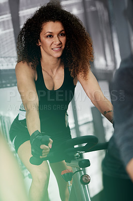 Buy stock photo Happy, bike and woman in spin class for training exercise, wellness and fitness in gym. Athlete, active or female person on aerobic machine for workout endurance, body or cycling equipment in club