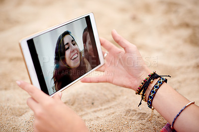 Buy stock photo Hands, girl and selfie with tablet screen at beach, relax outdoor for person with friends for bonding or online post. Photography, people and picture with vacation or weekend together with tech