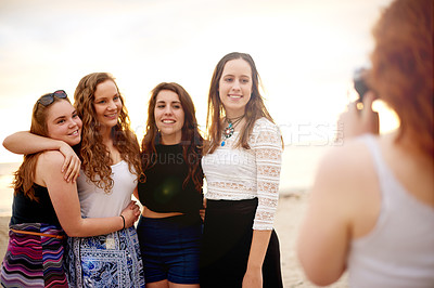 Buy stock photo Beach, friends and photography of women on holiday, smile or travel outdoor on tropical island. Happy girls, seashore or picture of group together for vacation, tourism and hug for memory at sunset