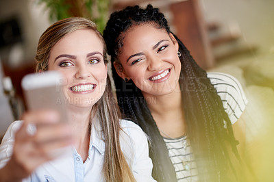 Buy stock photo Happy women, picture and relax with selfie for holiday, weekend or photography together in home. Female people, friends or capture moment with smile for bonding memory or social media post in house
