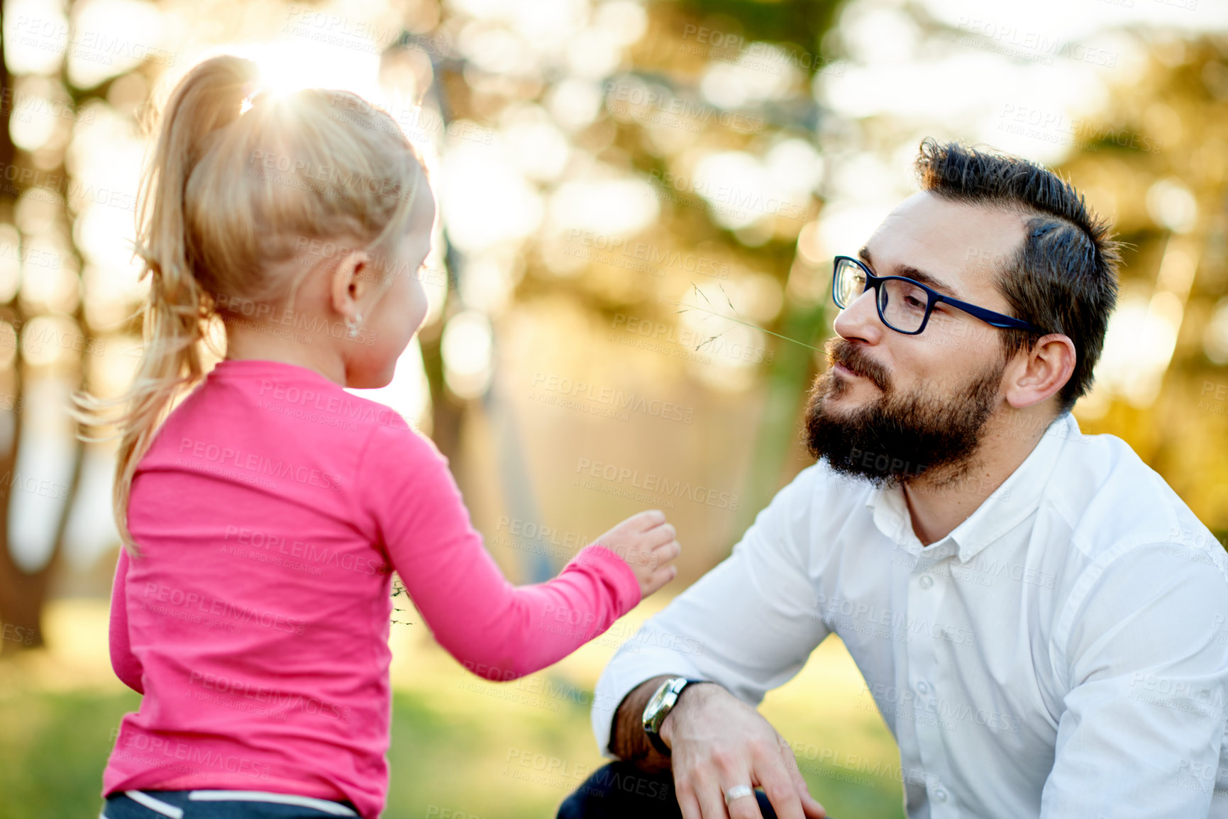 Buy stock photo Playful, father and girl in garden with stem, silly or outdoor fun in spring adventure. Happy moment, relax and family in nature with leaf, sunshine or bonding together for childhood development.
