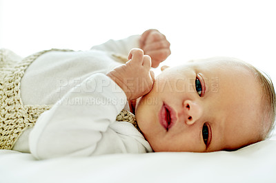 Buy stock photo Baby, lying and bed with sheet for nap time, rest or tired snooze of adorable infant in home. Newborn, child or kid relaxing with cotton clothing on warm fabric for peaceful development in house