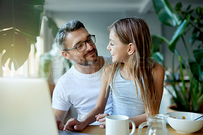 Buy stock photo Breakfast, laptop or remote work with father and girl child in home dining room together for bonding. Computer, development or food with daughter and freelance parent in apartment for small business