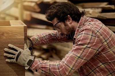 Buy stock photo Carpentry, build and man in workshop for manufacturing, cupboard or production process. Small business, woodwork and creative carpenter with hardware in warehouse for craft, trade or manual labor