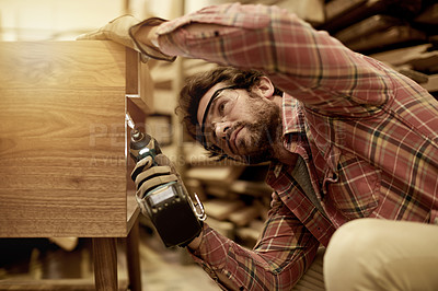 Buy stock photo Woodwork, drill and man in workshop for cupboard frame, production or manufacturing process. Small business, building and creative carpenter with power tools in warehouse for craft or manual labor