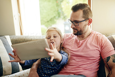 Buy stock photo Entertainment, dad and child on couch with tablet, streaming cartoon and family bonding on weekend. Mature man, girl or watching movie in home with tech for subscription app, love and care in support