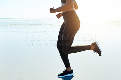Buy stock photo Fitness, legs and running with athlete on beach for cardio training, morning workout or speed. Exercise, feet and space with woman runner on sand by sea for challenge, health or physical improvement