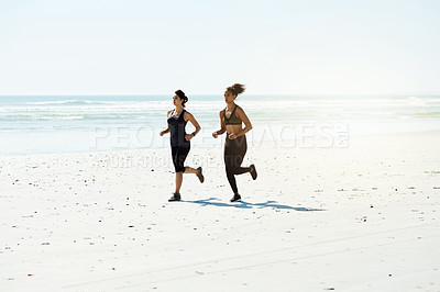 Buy stock photo Fitness, friends and running on beach for workout, wellness or cardio exercise with space. Women, runners and challenge at ocean for competitive training, endurance or marathon practice together