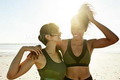 Buy stock photo Friends, hug and athlete women on beach for fitness, running break and bonding together. Space, people and embrace with flare for exercise support, sports training and workout recovery for wellness